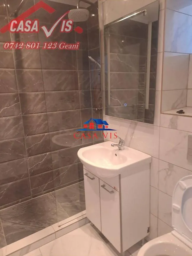 Apartament  2  camere in Onesti renovat parter - foto 9