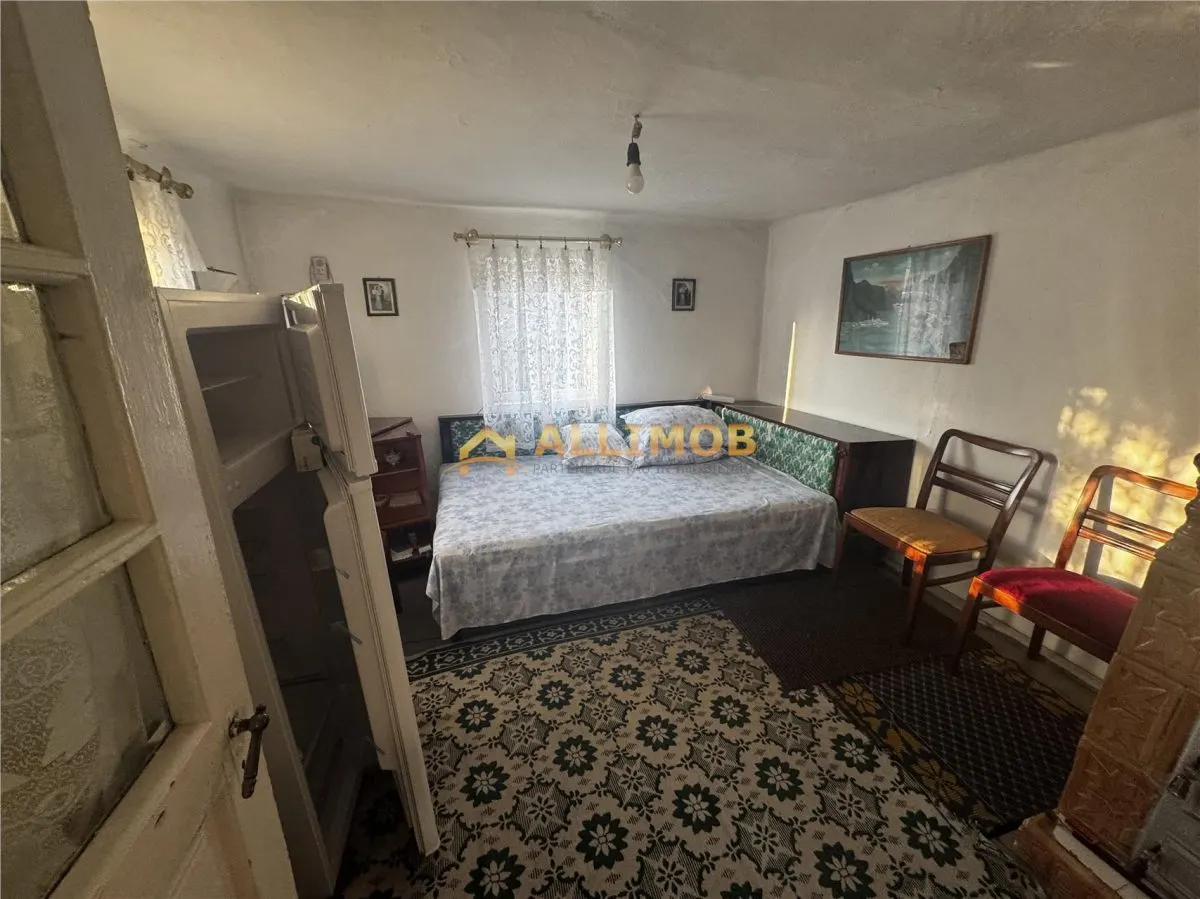 Casa batraneasca si teren 758 mp in Negoiesti. - foto 7