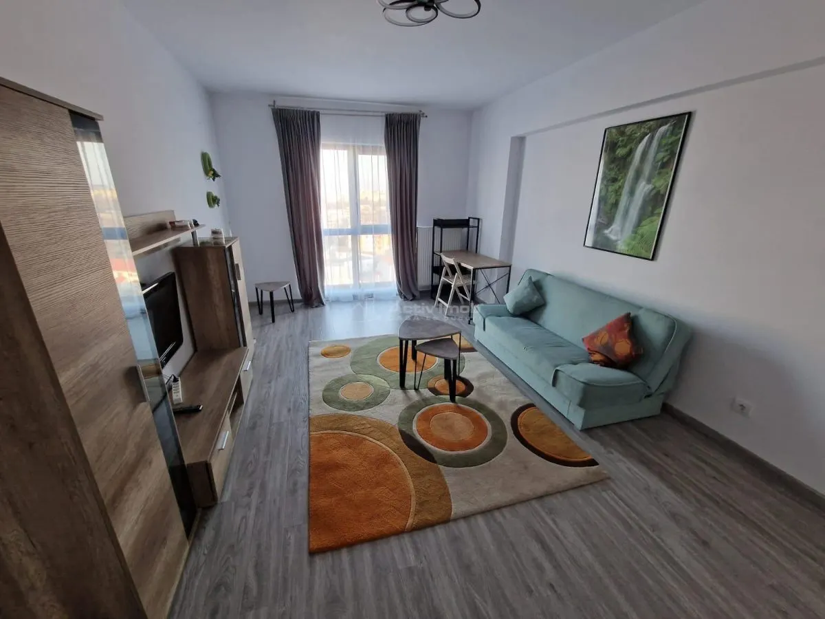 2 camere -Crangasi-loc de parcare subteran-mobilat si utilat- centrala proprie- AC- modern - foto 1