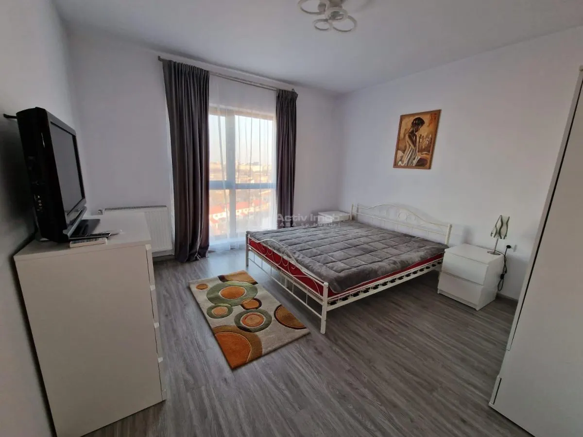 2 camere -Crangasi-loc de parcare subteran-mobilat si utilat- centrala proprie- AC- modern - foto 3