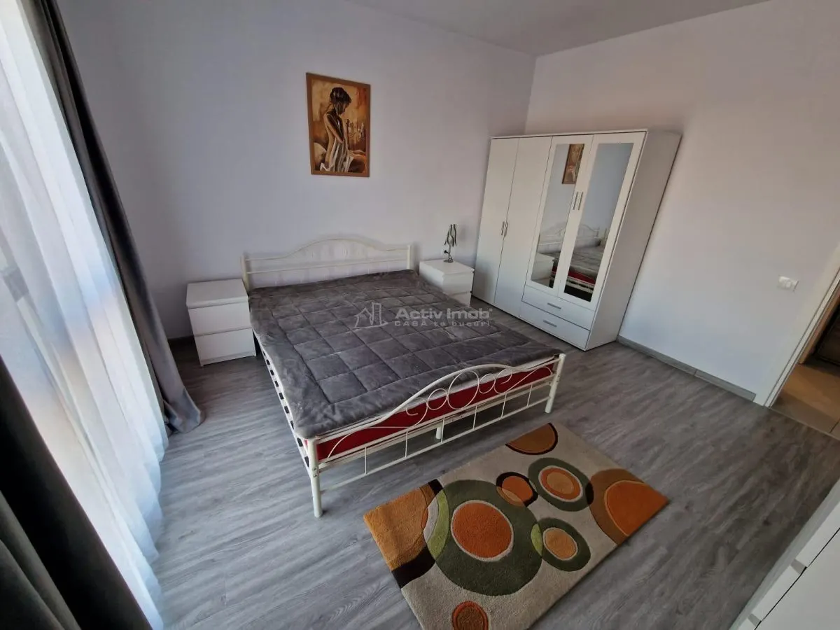 2 camere -Crangasi-loc de parcare subteran-mobilat si utilat- centrala proprie- AC- modern - foto 4