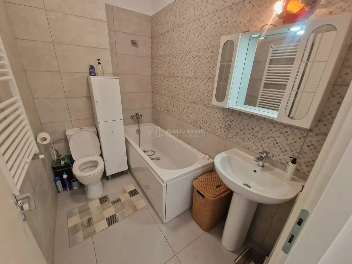 2 camere -Crangasi-loc de parcare subteran-mobilat si utilat- centrala proprie- AC- modern - foto 5