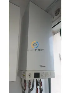 De inchiriat garsoniera Fratii Golesti cu centrala proprie - foto 5