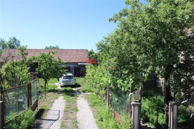 Casa cu 60 ari teren Coldau , Str. Principala - foto 30