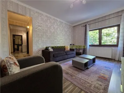 Apartament central cu acces la gradina si 2 locuri parcare - foto 3