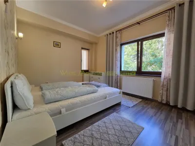 Apartament central cu acces la gradina si 2 locuri parcare - foto 5