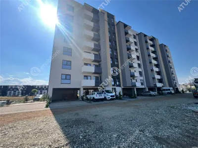 De vanzare apartament la etajul 2 cu 2 camere balcon parcare subterana zona Doamna Stanca din Sibiu - foto 2