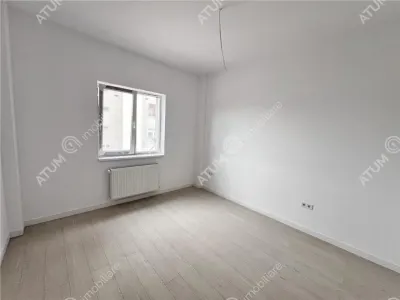 Apartament cu 3 camere decomandate 2 bai si 2 balcoane de vanzare in Sibiu zona Rahovei - foto 3