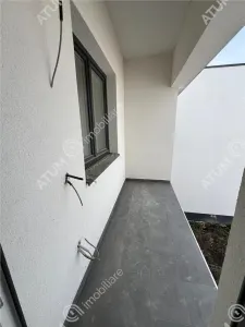 Casa de vanzare cu 4 camere 2 bai 2 balcoane si curte libera de 50 mp situata in zona Calea Cisnadiei din Sibiu - foto 16