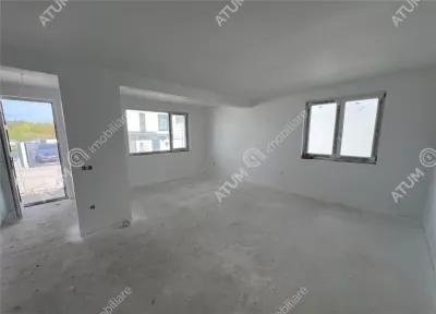 Casa de vanzare cu 4 camere 2 bai 2 balcoane si curte libera de 50 mp situata in zona Calea Cisnadiei din Sibiu - foto 19