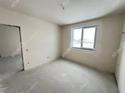 De vanzare apartament intabulat cu 3 camere decomandate 2 bai balcon si loc de parcare situat in Talmaciu/ Sibiu - foto 6
