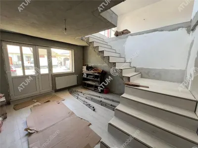 Casa de inchiriat la cheie cu suprafata de 200 mp Parter Etaj si curte 250 mp situata in zona Gusterita din Sibiu - foto 5