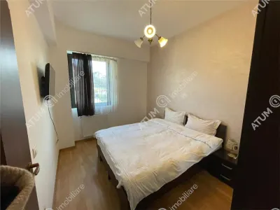 De inchiriat apartament cu 2 camere balcon si parcare amplasat la etajul 1 in zona Strand din Sibiu - foto 4