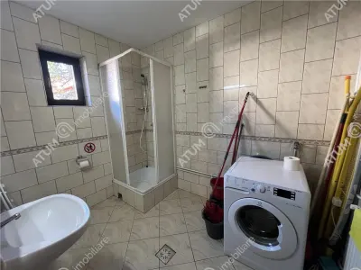 De vanzare pensiune de 7 camere cu 5 bai si teren de 377mp  situata in Paltinis cota 1440 m - foto 9
