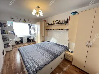 De vanzare apartament mobilat si utilat cu 3 camere 2 bai pivnita situat in zona Turnisor din Sibiu - foto 4
