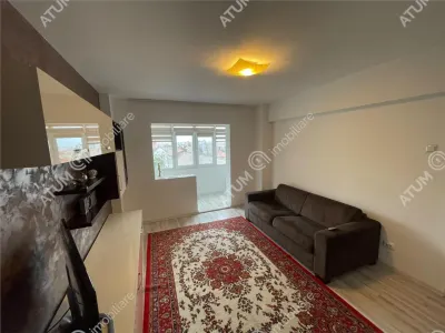 De inchiriat apartament modern cu 2 camere decomandate si balcon tip loggie in zona Mihai Viteazu din Sibiu - foto 2