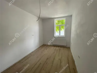 De vanzare apartament cu 2 camere pivnita si curte comuna in zona Piata Cluj din Sibiu - Sibiu