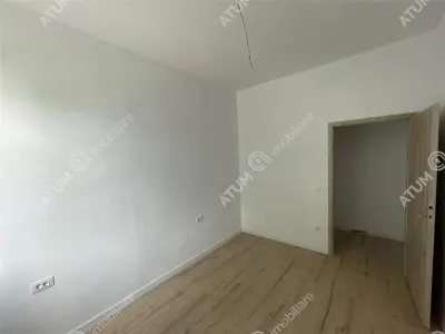 De vanzare apartament cu 2 camere pivnita si curte comuna in zona Piata Cluj din Sibiu - foto 3