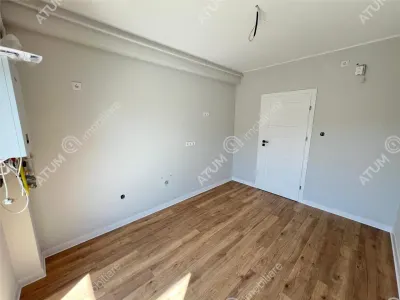 De vanzare apartament la cheie cu 3 camere gradina loc parcare zona Pictor Brana Selimbar - foto 9