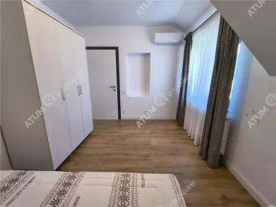 De inchiriat casa ultramoderna cu 4 camere 3 bai si dressing 170 mp utili in Sibiu - foto 16
