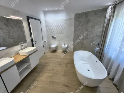 De inchiriat casa ultramoderna cu 4 camere 3 bai si dressing 170 mp utili in Sibiu - foto 25