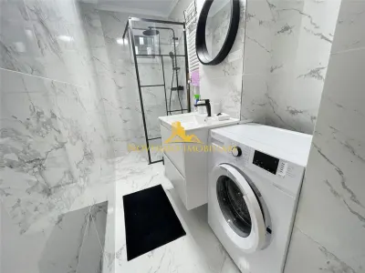 NOVISIMO-IMOBILIARE: AP. CU DOUA CAM. IN ZONA MARASESTI - foto 6