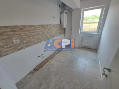 De vanzare apartament 2 camere, 61,55 mp, decomandat, baie cu geam, bloc nou Bucium Visan - foto 6