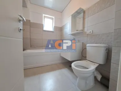 De vanzare apartament 2 camere, 61,55 mp, decomandat, baie cu geam, bloc nou Bucium Visan - foto 7