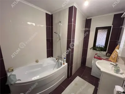 De vanzare casa cu 3 camere pivnita si pod amplasata pe teren de 438 mp zona Calea Cisnadiei din Sibiu - foto 10