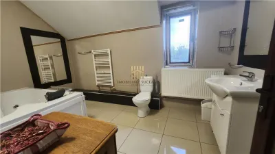 Casă modernă de vânzare în Rădăuți, Bucovina | 3 dormitoare | 3 băi | Garaj | Foișor | 185.000 Euro - foto 9