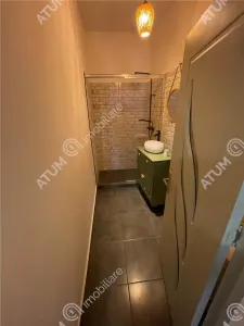 De vanzare apartament cu 2 camere si gradina situat in zona centrala a orasului Cisnadie - foto 11