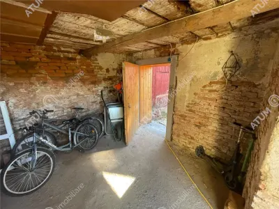 De vanzare apartament cu 2 camere si gradina situat in zona centrala a orasului Cisnadie - foto 18