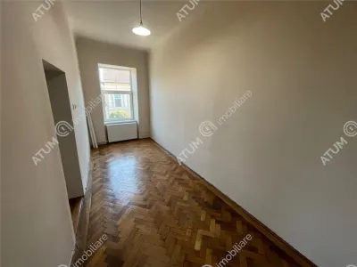 De vanzare apartament cu 2 camere si gradina situat in zona centrala a orasului Cisnadie - foto 4