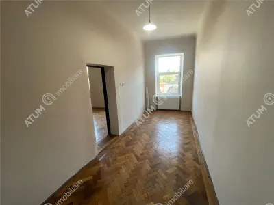 De vanzare apartament cu 2 camere si gradina situat in zona centrala a orasului Cisnadie - foto 5