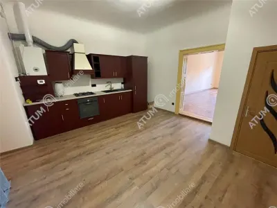 De vanzare apartament cu 2 camere si gradina situat in zona centrala a orasului Cisnadie - foto 7