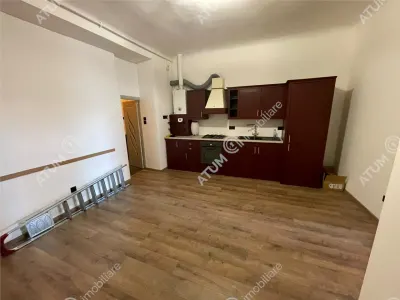 De vanzare apartament cu 2 camere si gradina situat in zona centrala a orasului Cisnadie - foto 8