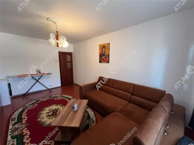 De vanzare apartament cu 3 camere decomandate 2 bai zona Vasile Aaron din Sibiu - foto 2