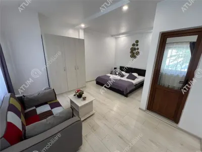 De vanzare pensiune cu 4 camere 4 bai situata in zona istorica din Sibiu - foto 15