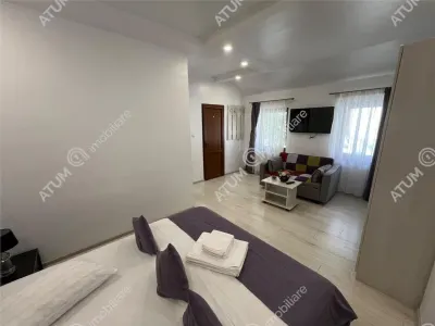 De vanzare pensiune cu 4 camere 4 bai situata in zona istorica din Sibiu - foto 16