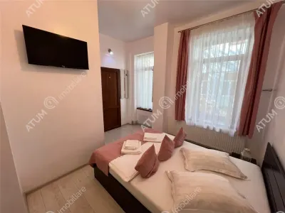 De vanzare pensiune cu 4 camere 4 bai situata in zona istorica din Sibiu - foto 3
