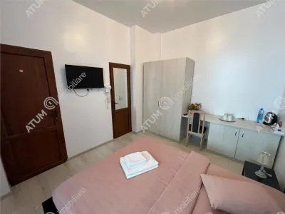 De vanzare pensiune cu 4 camere 4 bai situata in zona istorica din Sibiu - foto 5