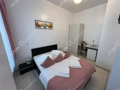 De vanzare pensiune cu 4 camere 4 bai situata in zona istorica din Sibiu - foto 7