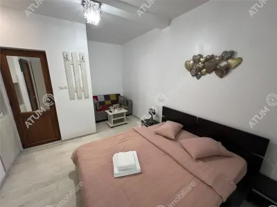 De vanzare pensiune cu 4 camere 4 bai situata in zona istorica din Sibiu - foto 8