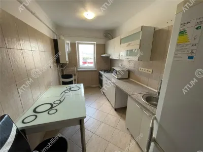 De inchiriat apartament cu 3 camere decomandate si balcon tip loggie in zona Vasile Aaron Sibiu - foto 11