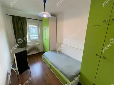 De inchiriat apartament cu 3 camere decomandate si balcon tip loggie in zona Vasile Aaron Sibiu - foto 7