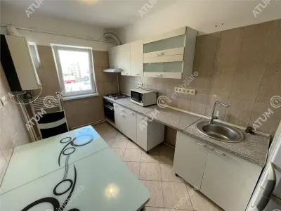 De inchiriat apartament cu 3 camere decomandate si balcon tip loggie in zona Vasile Aaron Sibiu - foto 10