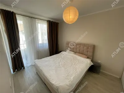 De inchiriat apartament modern cu 2 camere decomandate balcon si loc parcare in zona Brana din Selimbar - foto 4