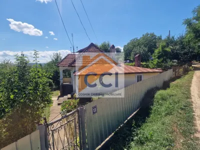 Casa in mediu rural cu teren - foto 17
