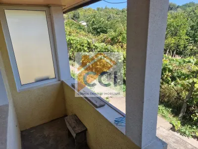 Casa in mediu rural cu teren - foto 22
