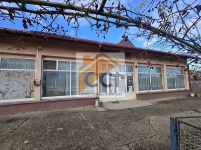 Se oferă spre vânzare / închiriere clădire cu spațiu comercial - foto 15